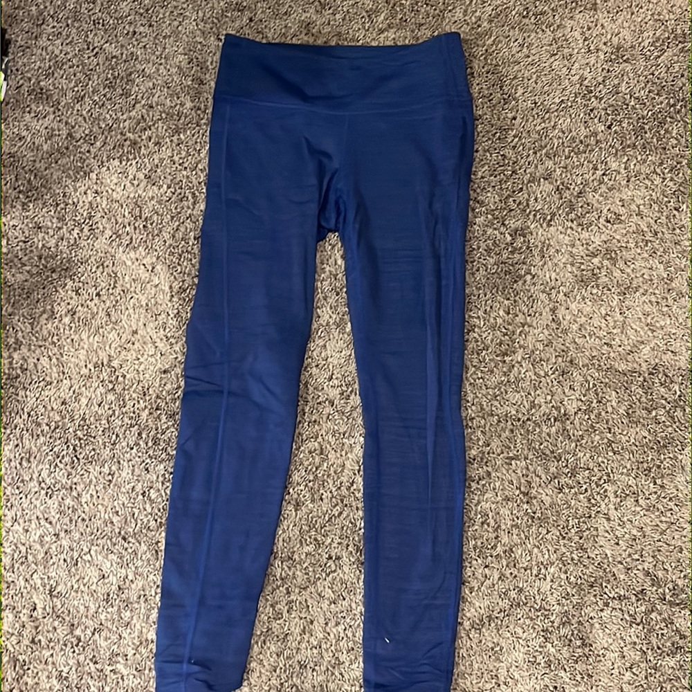 Size S Athleta leggings with a fun striped like pattern. Great like condition.